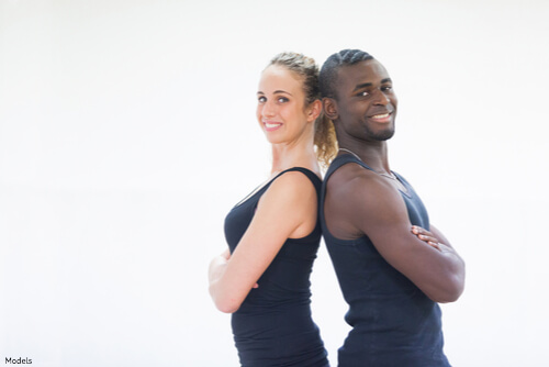 Man and woman and standing back to back