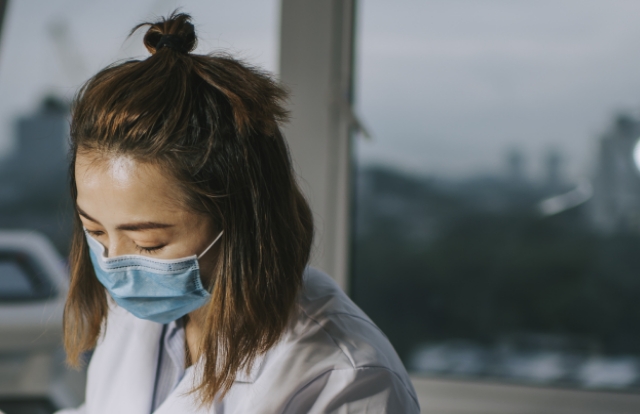 doctor examining patient